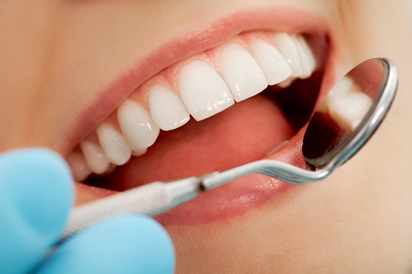 How Can Fluoride Help Your Teeth?