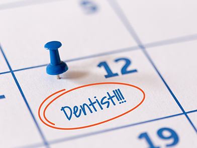 Calendar with dentist appointment circled on the 12th, representing dental scheduling at North County Cosmetic and Implant Dentistry in Vista, CA